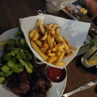 Steak tips, brocolli, and fries. Excellent!