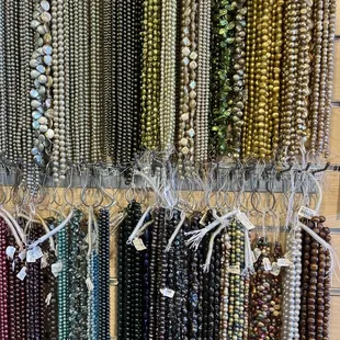 The greens, blues, and darker colored Pearl strings