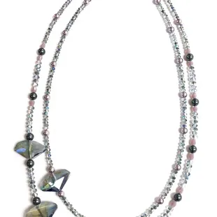 Double strand necklace made with crystals and pearls.