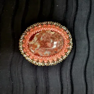Beaded broach