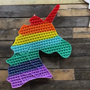 a rainbow colored unicorn