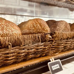 a variety of buns in a display case