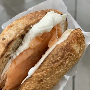 Whole wheat bagel with cream cheese and lox