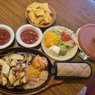 Chips, salsa and chicken fajita meal
