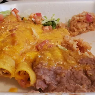 Chicken enchilada plate. The smallest enchiladas I&apos;ve ever seen.
