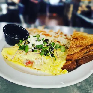 Greek omelet with fresh arugula microgreens