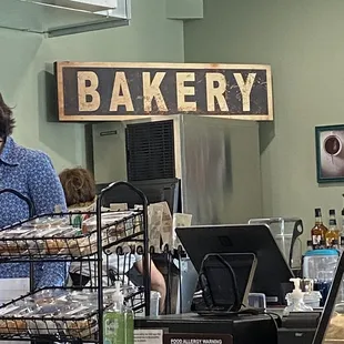 a woman behind the counter