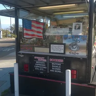 a street corner with an american flag