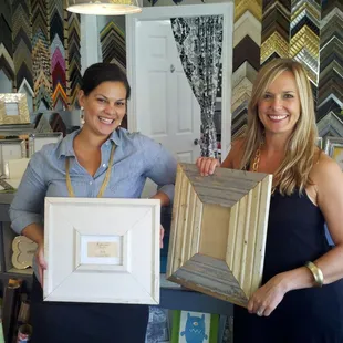 Grand Frames owners, Katie and Elissa, are ready to help you pick out your custom frame or find the perfect gift.