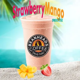 a strawberry mango smoothie on the beach