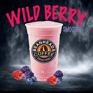 a smoothie with raspberries and blueberries