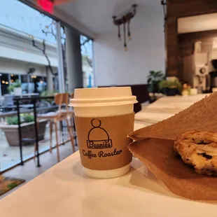 a cup of coffee and a muffin