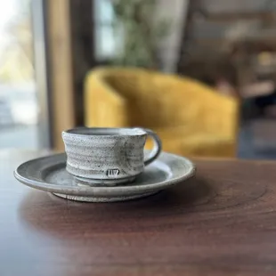 a coffee cup on a saucer