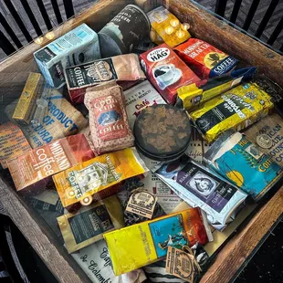 ows a wooden box filled with snacks