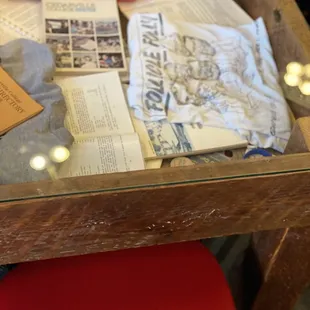 bad photo of one of the cute tables that they have memorabilia in.