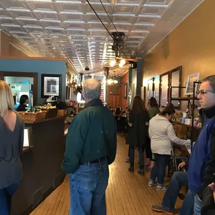 a group of people in a coffee shop