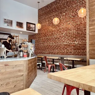As you enter...love the brick wall.