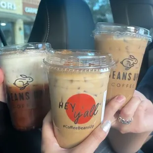 Left to right: iced tiramisu latte, iced cinnamon roll latte, iced beans up special