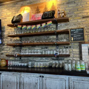 a bar with a brick wall