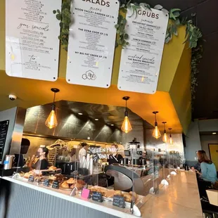 a restaurant counter with menus