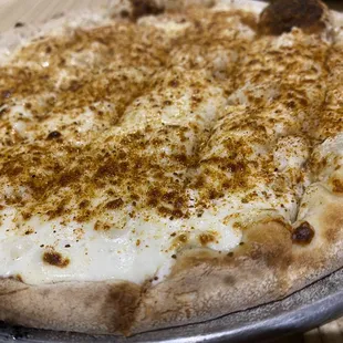Crab Pizza:  10" Pizza with Lump Crab Meat, In-house Made Garlic White Sauce and Old Bay Seasoning.