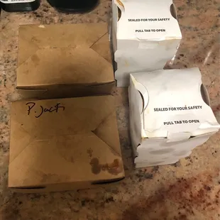 two boxes of food on a counter