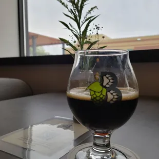 a glass of beer on a table