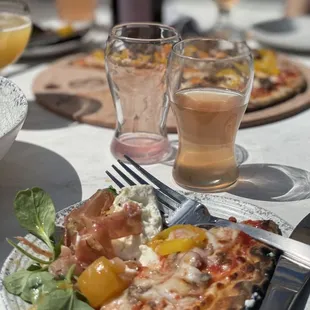 Hard seltzer, pizza and a bit of the burrata