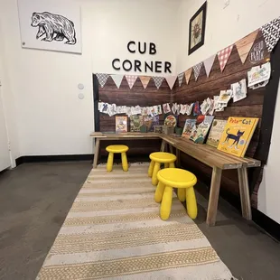 cub corner with yellow stools