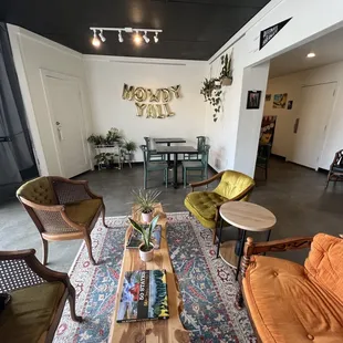 a coffeehouse with a coffee table and chairs