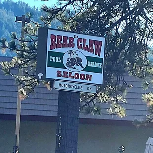a sign in front of a building
