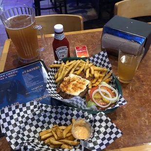 This is the black and blue 1/2 pound burger with the delicious seasoned fries and Napa Smith lager. Most enjoyable!