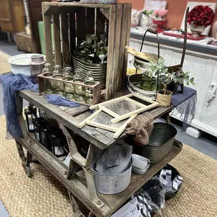 a rustic display of pots and pans