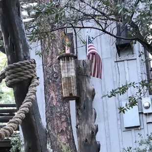 Bird Feeders next to porches and window so neat!