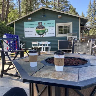 a table with a cup of coffee on it