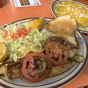 Blackened catfish and green enchiladas