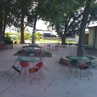 tables and chairs in a park
