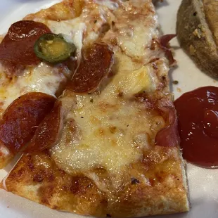 a slice of pepperoni and cheese pizza