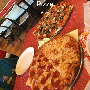 Half Cheese/Half Pepperoni &amp; Sausage,mushrooms,pepperoni &amp; olives on the other