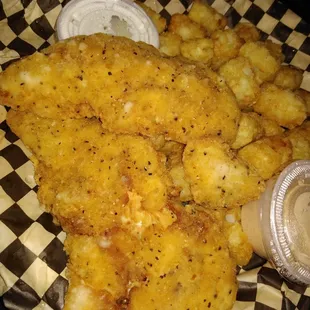 a plate of fried tater tots