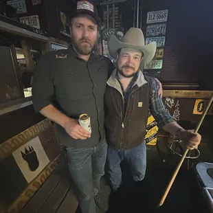 Dusty Rust and band mates playing pool and enjoying beers