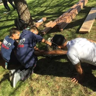 After-school teens are building picnic tables for the library. The Denver Tool Library is helping out with their tools and expertise.