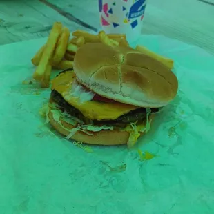 a cheeseburger and fries