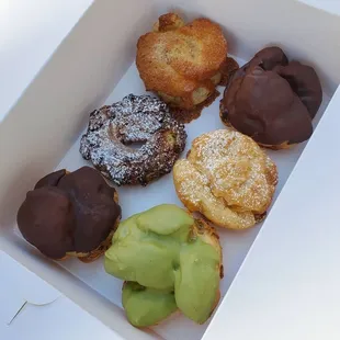 Honey butter, crispy almond, chocolate eclair, original &amp; green tea eclair shells with fillings like vanilla, chocolate and green tea