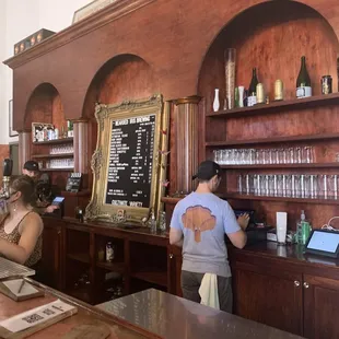 a man and a woman at the bar