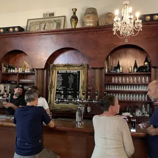 a group of people at the bar