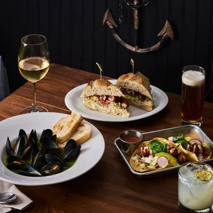MUSSELS IN HERB BUTTER &amp; PERNOD.
 CHICKEN MILANESE.
 FISH TACOS