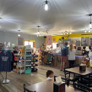 people in a store with many items