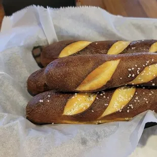 a basket of bread sticks
