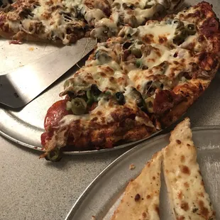 Mama Bearno's pizza and garlic bread.